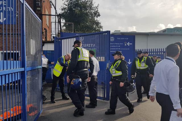 Police arrive at the ground through the Victory south gate