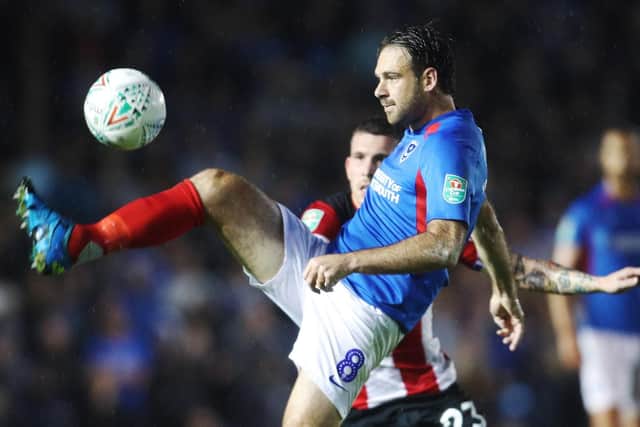 Brett Pitman plays a pass