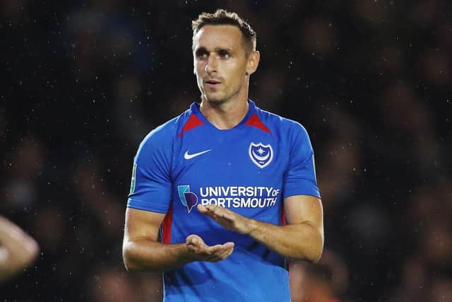 Brandon Haunstrup applauds the Fratton faithful after Pompey's loss to Southampton. Picture: Joe Pepler