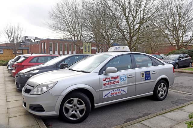 Albert Xhediku's taxi at Mountbatten Centre the day after the death 
Picture: Solent News & Photo Agency