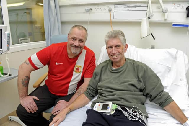 02/01/18
Pompey fan Chris Scovell (right) meets Steve Sedgewick at Queen Alexandra Hospital after Steve saved his life by administering CPR after he collapsed from a heart attack in Portsmouth.
Picture Ian Hargreaves  (020119-1)