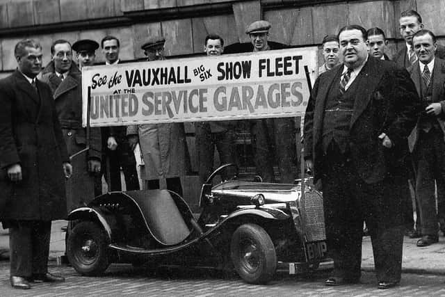 Twenty-seven stones Teddy Brown promoting a miniature vehicle in 1936.