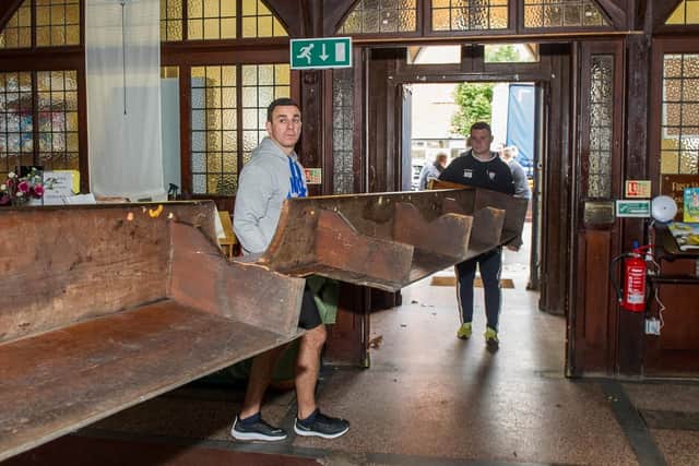 Sailors removing some of the pews.
Picture: Habibur Rahman