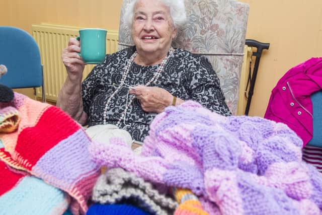 Rita Wight 92 drinking coffee and knitting.

Picture : Habibur Rahman