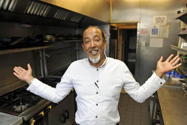 Babul Miah celebrates after earning his first ever five star hygiene rating at his restaurant, the Bombay Express Bali in Southsea.Picture: Ian Hargreaves  (010919-1)