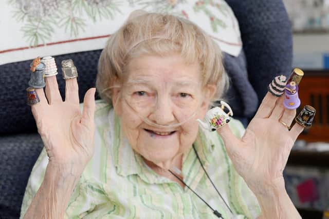 Gladys Minter, 82, otherwise known as 'Rusty', from Leigh Park, has a collection of just shy of 27,000 thimbles she has collected over the years. Picture: Sarah Standing (021019-8512)