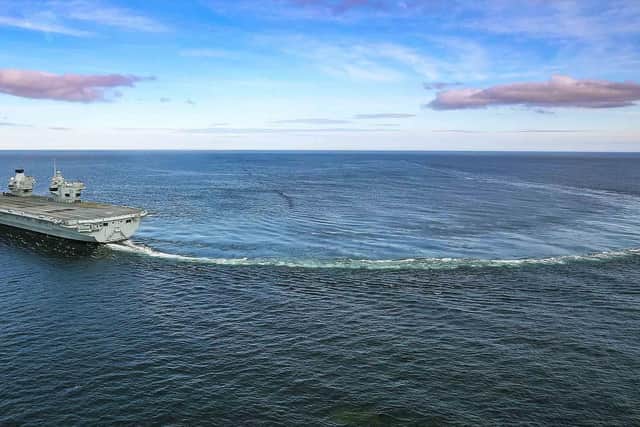 Britain's newest aircraft carrier has hit top speed as she tested her engines to the max in the North Sea. HMS Prince of Wales thundered through the sea at 25 knots as her diesel generators and gas turbines were pushed to full throttle during only her second week of trials. Picture: LPhot Alex Ceolin