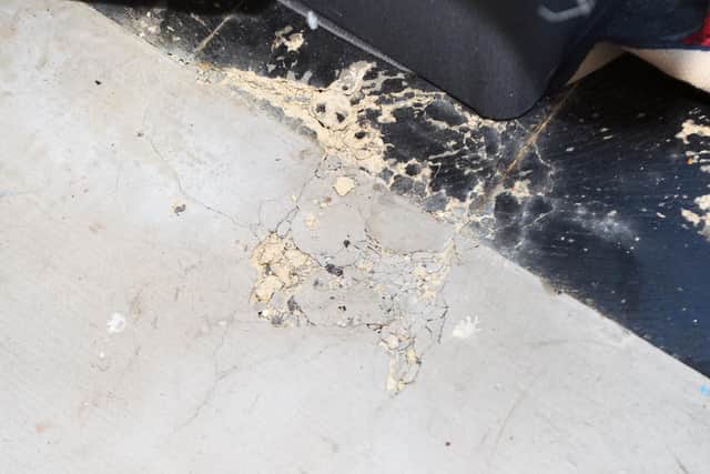 Uneven, cracked flooring at Paige Bailey's Renown Gardens flat.

Picture: Sarah Standing (300919-7827)