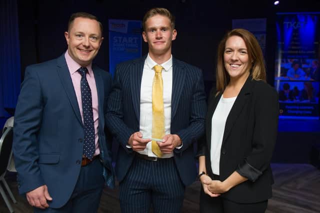 Teach Portsmouth Awards at the Gaiety bar, Southsea. Pictured : Gavin Lumsden and Louise Lumsden presenting an award to Ben Morris for Innovation. Picture : Habibur Rahman