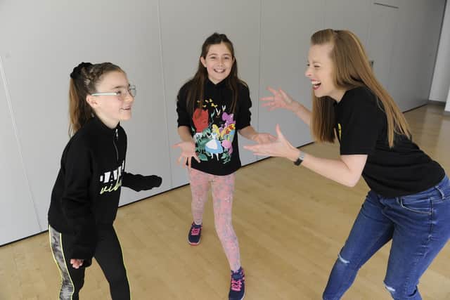 Eva Willmott, nine, left, and Mary Wallace, 10, with Alaina. Picture: Ian Hargreaves (061019-5)