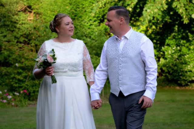 Charlotte and Andy pose for their wedding pictures. Picture: Mark Robbins Photography