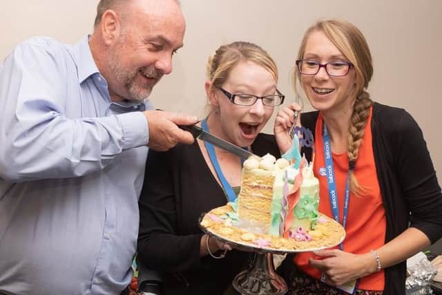 HMS Collingwood Macmillan 2019. caption: Steve Matthews, Hayley Packer and Shona Kirk of the ITSC enjoying the cakes.
Photographs courtesy of Keith Woodland, Crown Copyright.