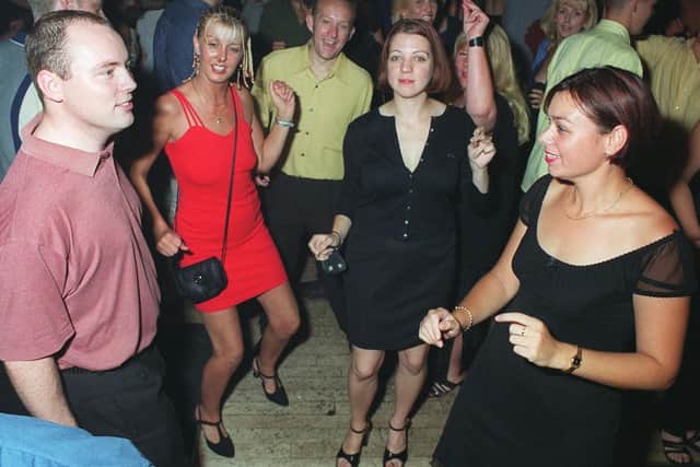 Revellers dancing the night away at Buddies 25+ nightclub at The Pyramids Centre, Southsea.