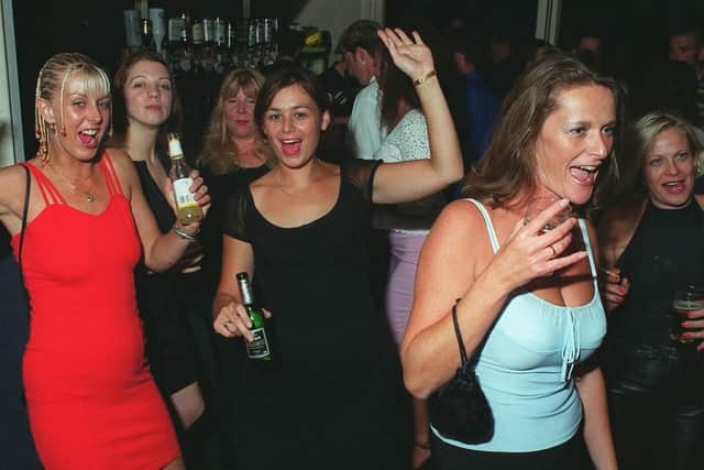 Revellers dancing the night away at Buddies 25+ nightclub at The Pyramids Centre, Southsea.