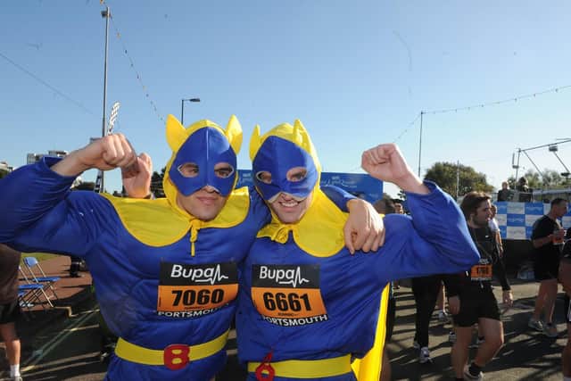 Stephen Bell (left), and Steve Parker as banana men finish The 2010 Great South Run at Southsea. Picture: Ian Hargreaves  (103426-14)