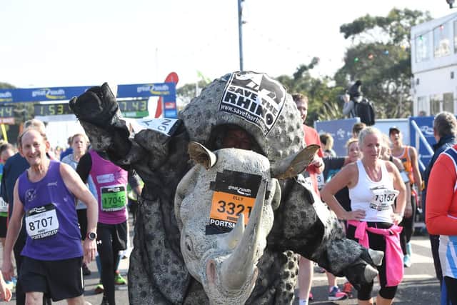 Great South Run 2016 finish line. Elly Mcmeehan 33 dressed as a rhino Picture: Paul Jacobs (160271-44)