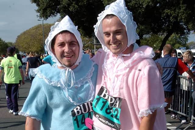 Matt Hill (30), left and Ian McCallun (25) after finishing the Great South Run. Picture: Matt Scott-Joynt (044993-182)
