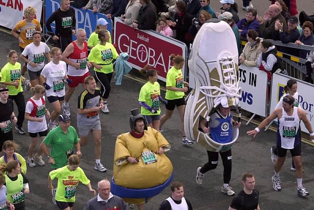 Competitors in costume taking part in the BUPA Great South Run 2004 event at Clarence Esplanade, Southsea. Picture: Michael Scaddan (044970-0540