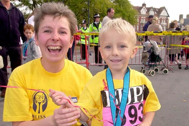 Great South Run 2003 in Southsea mini junior great south run, Julia Palmer with son Billy Palmer who was 6 today. Picture Paul Jacobs (035120-5)