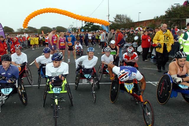 The 2006 BUPA Great South Run. Horrendous weather conditions for the wheelchair start. Picture: Malcolm Wells (064553-76)