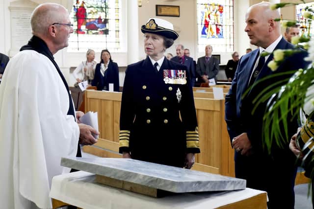 Pictured here are Lieutenant Commander Mike Browning, HRH The Princess Royal and Gareth Derbyshire at St Ann's Church where HRH The Princess Royal unveiled the Memorial Stone for HMS Royal Oak