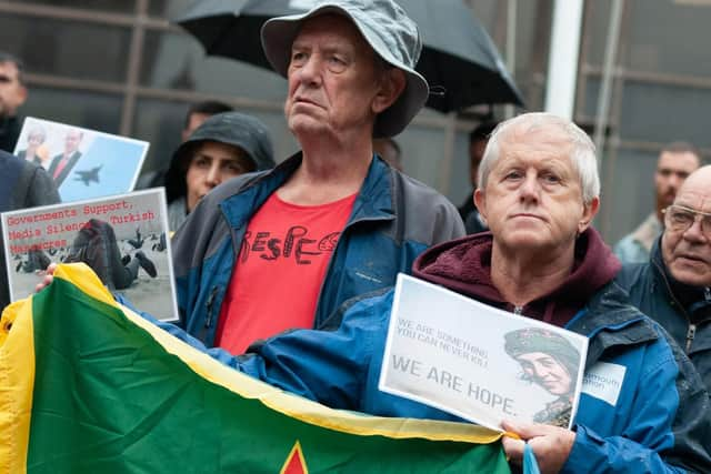 Portsmouth Kurdish community protesting on Saturday, highlighting Turkey's invasion of Kurdish-held land.