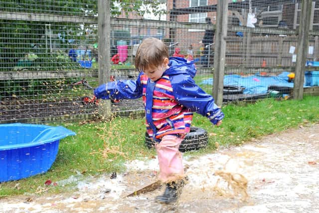 Pictured is: Riley Paul (3) playing in the Acorn Room's current garden.

Picture: Sarah Standing (111019-8731)