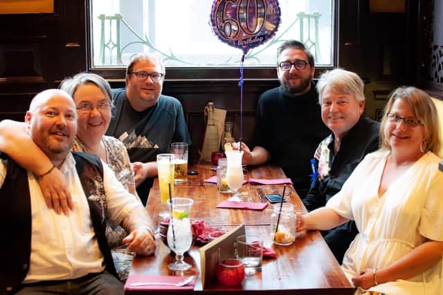 Tim McIlroy second right, with, clockwise from left, son Russell, wife Penny, son Matthew, son-in-law Chris, and daughter-in-law Kerry.