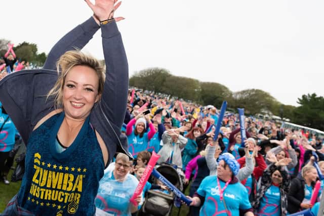 Zumba warm up before the walk. Picture: Duncan Shepherd