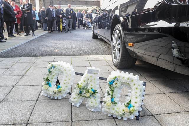 Floral tributes at the funeral.

Picture: Habibur Rahman