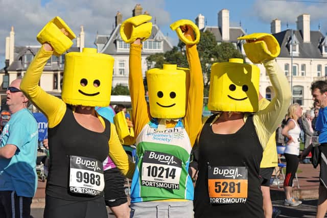 From left: Alison Smith, Sarah Langborne and Penny Langborne dressed as Lego men in the 2010 Great South Run. Picture: Sarah Standing (103427-903)