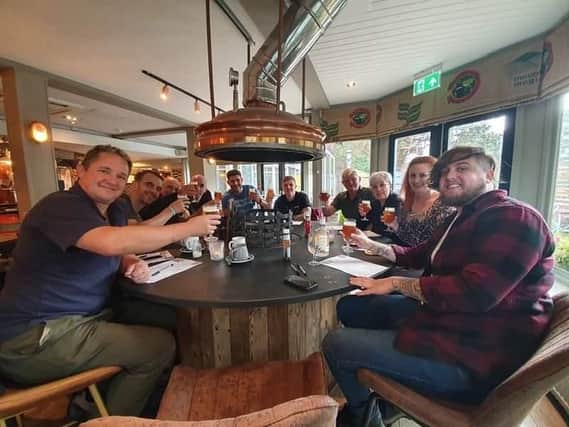 Veterans and current armed forces personnel taking part in Brewhouse and Kitchen Southsea's Veterans Day Brew.