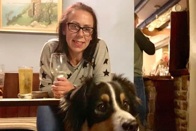 Natasha Walker, Katrice Lee's sister, with her three-year-old Australian Shepherd dog Wilf