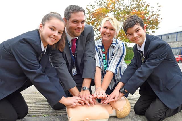 Jasmine Burnham, 13, with Jon Hamer, head of PSHRE at the college, Laura May, education healthcare assistant, and Thomas Mannie, 13.

Picture: Malcolm Wells