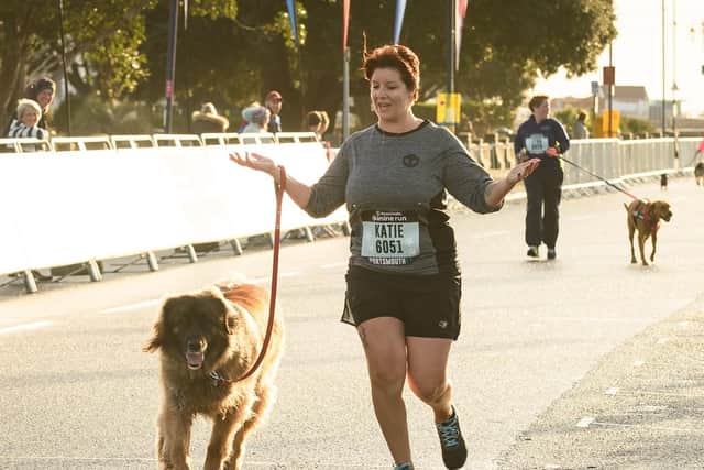 A dog and their owner finishing
