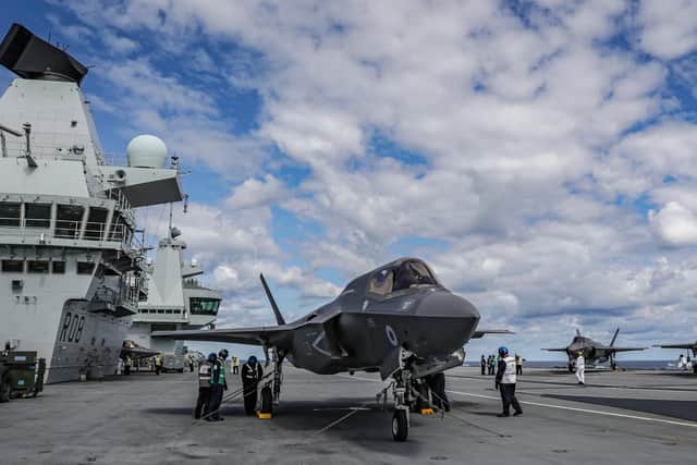 Four F-35B stealth jets, built by aerospace giant Lockheed Martin, are on HMS Queen Elizabeth at the moment - with more set to join the ship in the coming weeks. Photo: LPhot Kyle Heller