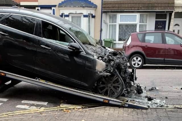The black car damaged in a fire in Powerscourt Road near the junction with Drayton Road. A red Ford Focus and the black car went up in flames at 4.20am on Monday, October 21, 2019. Picture from resident