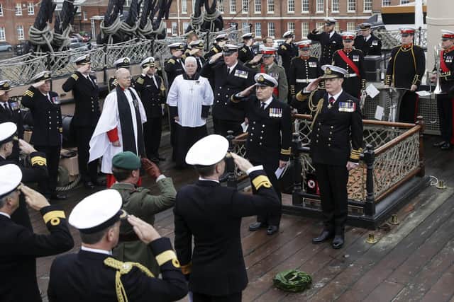 Sailors gather to salute Admiral Lord Nelson during a ceremony on his former flagship, HMS Victory. Photo: Leading Photographer Ben Corbett