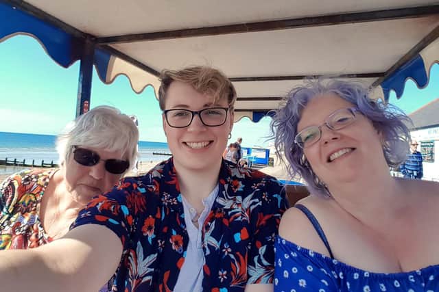 Connor Shellis with his mum and grandmother
