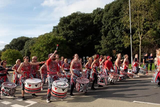 Batala Drum Band provided rhythmic support to the runners. (201019-289)