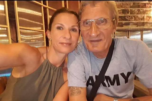 Laura Woodhams, left, with her dad Michael during happier times in Hayling Island. Picture: Supplied