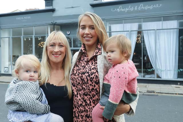 Freya Rose, left, with Willow, 14 months, and Jennifer Sanchez, with Alba, 14 months, pictured outside their shops in Grove Road South, Southsea. 
Picture: Chris Moorhouse     (231019-)