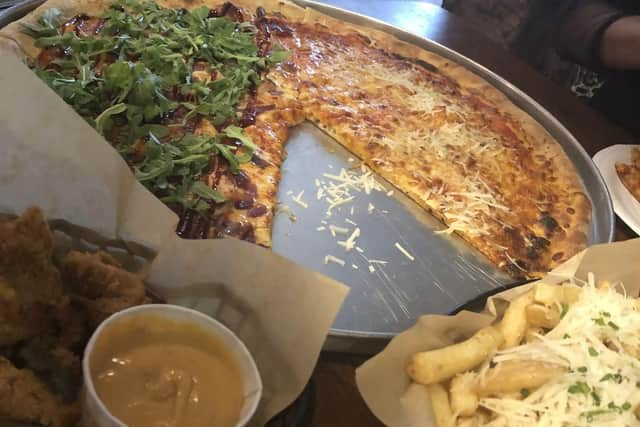 Basket of nuggets, half-an-half-pizza of Margherita and The Big Handsome  and a basket of Brooklyn fries