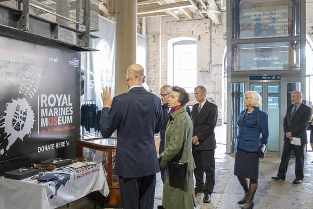The Princess Royal, Princess Anne, right, with the head of the curatorial department of the National Museum of the Royal Navy, Matthew Sheldon.