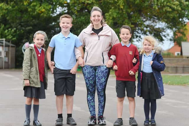 Head teacher, Katie Hoebee, with (left to right), Phoebe Adams, Fraser Livingstone, Raffaele Celani-Smith and Elsie Smith.
Picture: Sarah Standing
