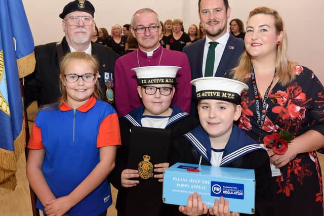 Portsmouth Central Poppy Appeal has its official launch at Cascades to mark its fundraising driver over the Remembrance period - (Back row L-R) Guy Wison, Bishop Paul Miles-Knight, Stephen Morgan MP, Cathy Hall (Portsmouth Central Poppy Appeal organiser), (Front row L-R) Lilyann More (10yrs), Aston Denison (8yrs), Harley Cocks (10yrs).