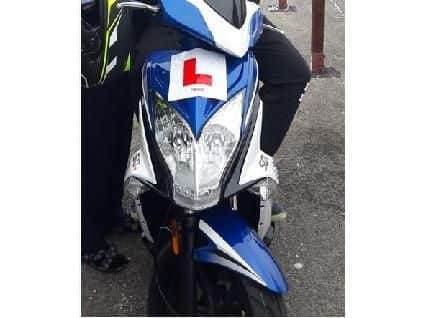 The white and blue moped, registration HK18 FCD Picture: Hampshire Constabulary