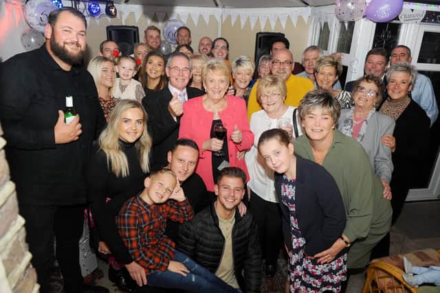 Brenda and Peter with their family at their surprise party. Picture: Sarah Standing (171019-9529)