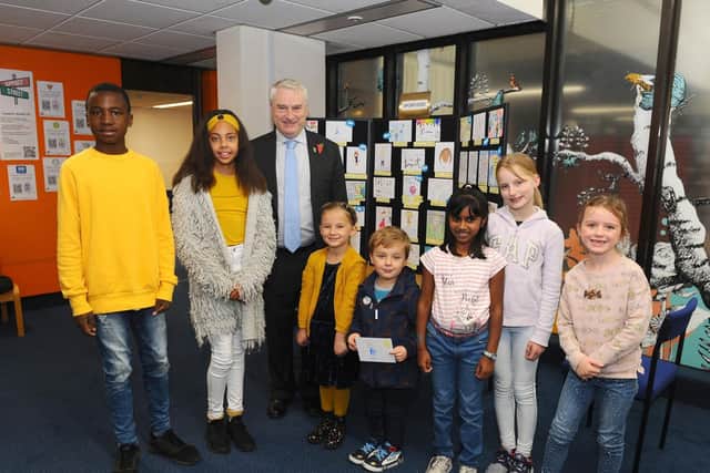 Pictured is: Leader of Portsmouth City Council Gerald Vernon-Jackson with some of the winners (l-r) Kassidy Figoue, Emelia Sawford, Teddy Carroll-Smith with her brother Kip, Vanathy Mohanaram, Isabel Boddington and Grace Cameron.

Picture: Sarah Standing (291019-383)