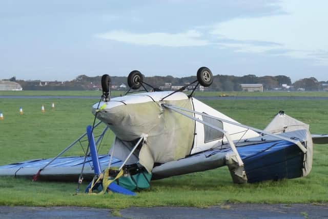 Heavy wind flipped a plane onto its roof at Solent Airport on Saturday. Photo: John Oram